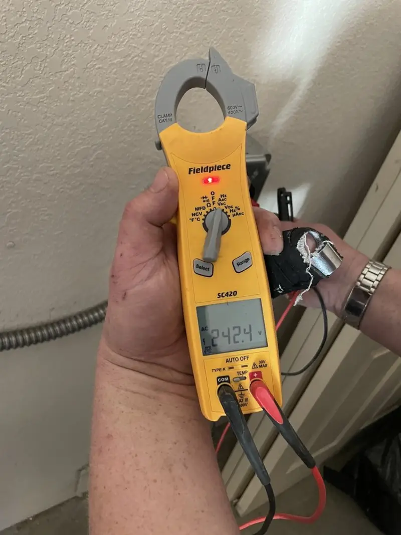 Voltage testing with clamp meter during Circuit Breaker Repair in Hebron